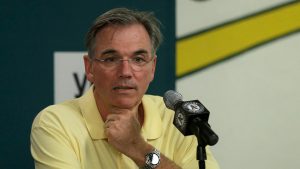 billy beane responds to a question during a press conference