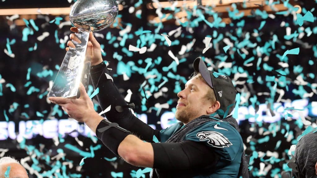 Nick Foles hoists the Super Bowl trophy after leading the Philadelphia Eagles to victory over Tom Brady and the fading New England Patriots. The Super Bowl MVP is one of our Week 16 Sneaky Plays for Your Daily Fantasy Football Lineup.