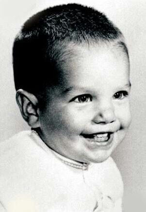A picture of Tom Cruise as a baby.