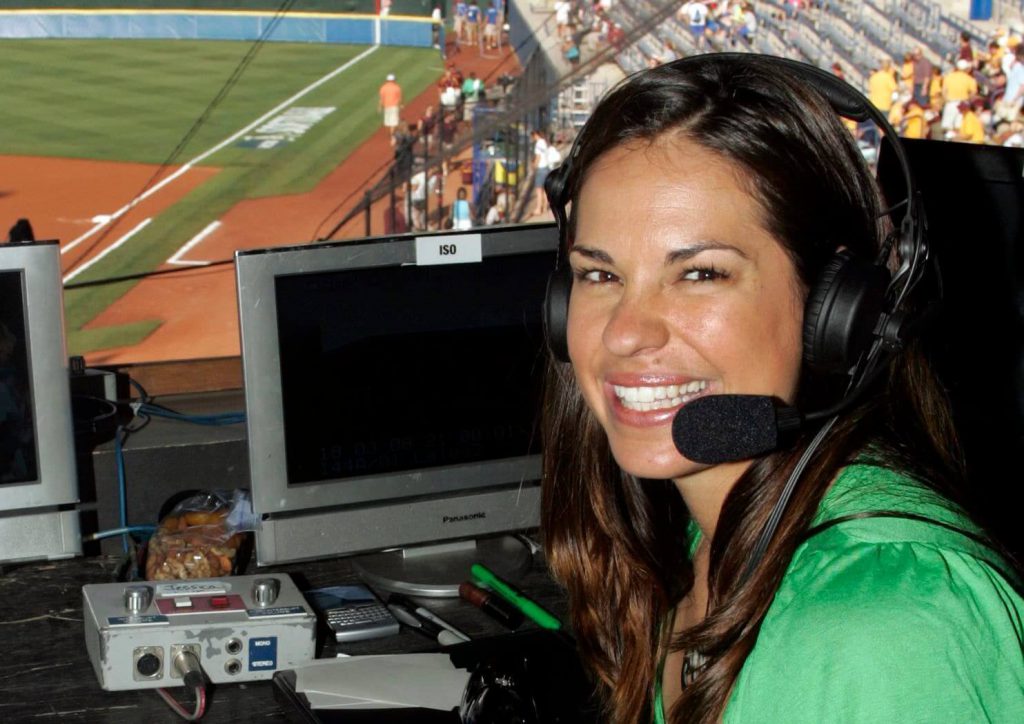 Jessica Mendoza flashes a pearly-white smile before announcing an NCAA softball game from the ESPN booth