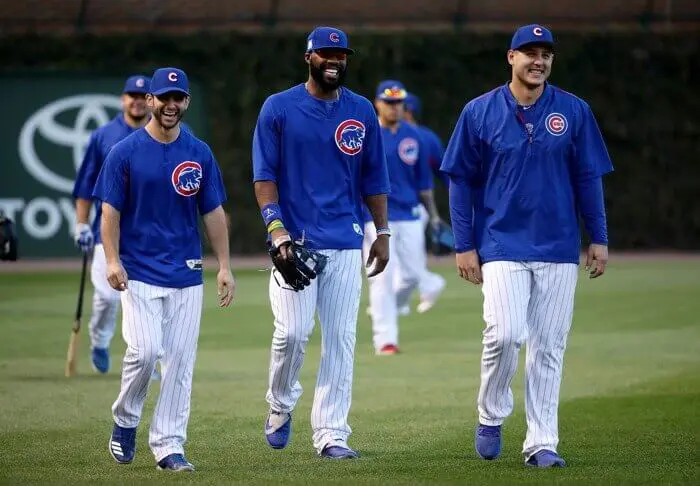 Tommy La Stella shares a laugh with fellow Chicago Cubs Jason Heyward and Anthony Rizzo in 2016.