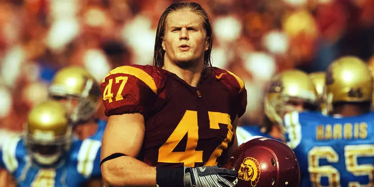 Clay Matthews removes his helmet as he leaves the field for the USC Trojans