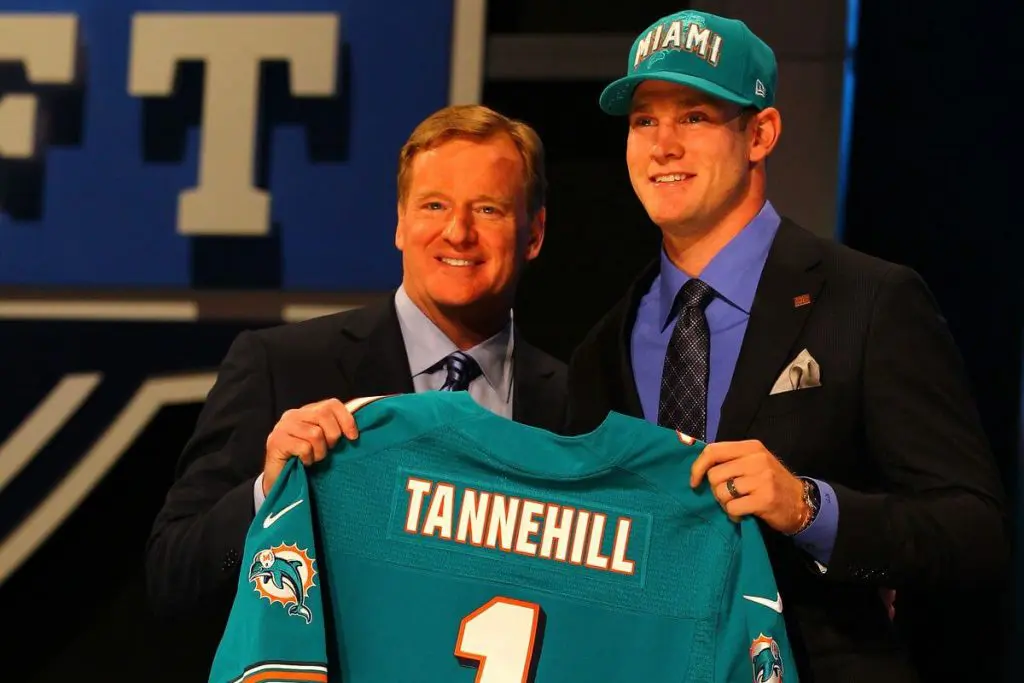 Ryan Tannehill stands on the podium with Roger Goodell at the 2012 NFL Draft