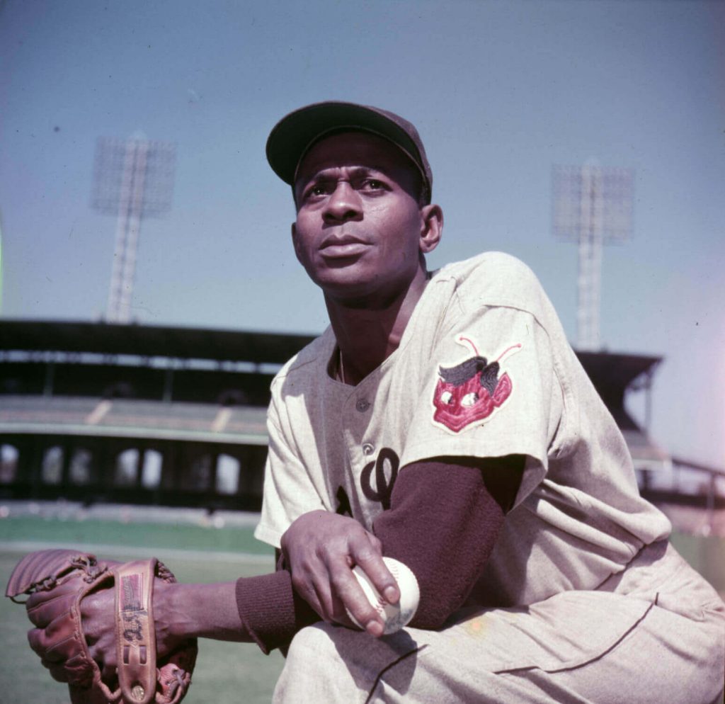 Satchel Paige, posing for his baseball card picture here with the St. Louis Browns, was the oldest MLB rookie ever