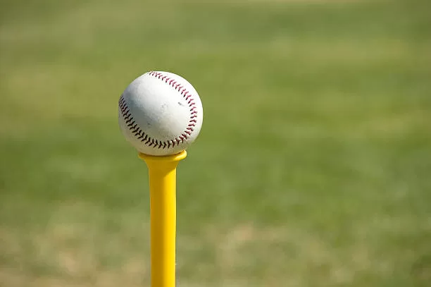 Baseball on batting tee