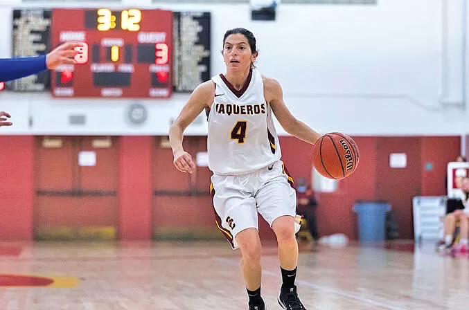 Number 4, Vicky Oganyan, dribbles down the court for Glendale Community College